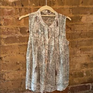 Sleeveless button down top